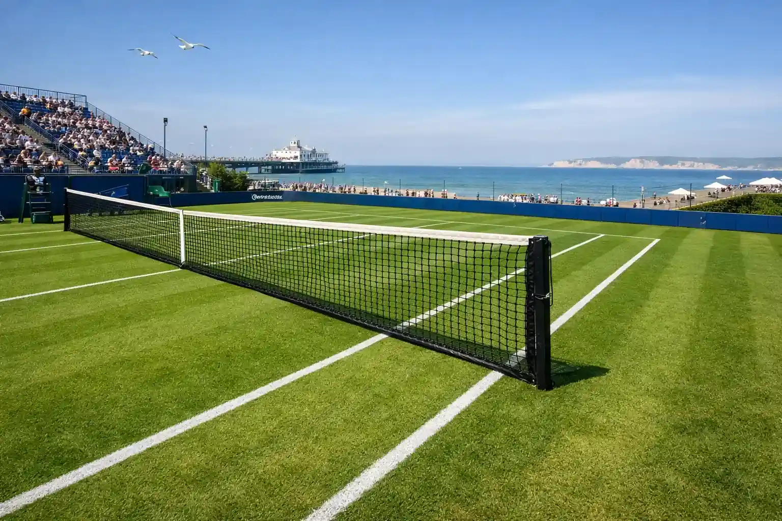 Eastbourne tennis tournament coastal venue with grass court and English Channel in background
